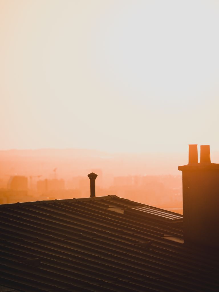 Rehausse de toiture créant un étage habitable supplémentaire sur maison belge