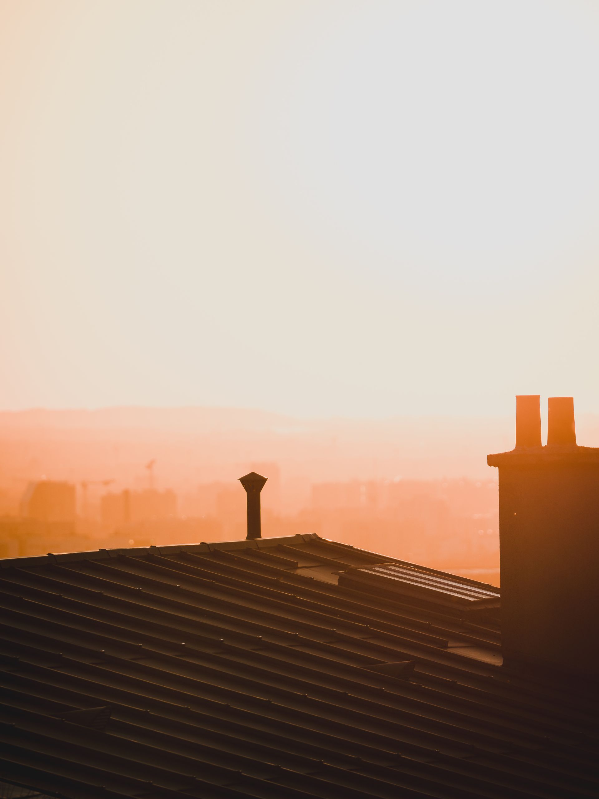 Rehausse de toiture créant un étage habitable supplémentaire sur maison belge